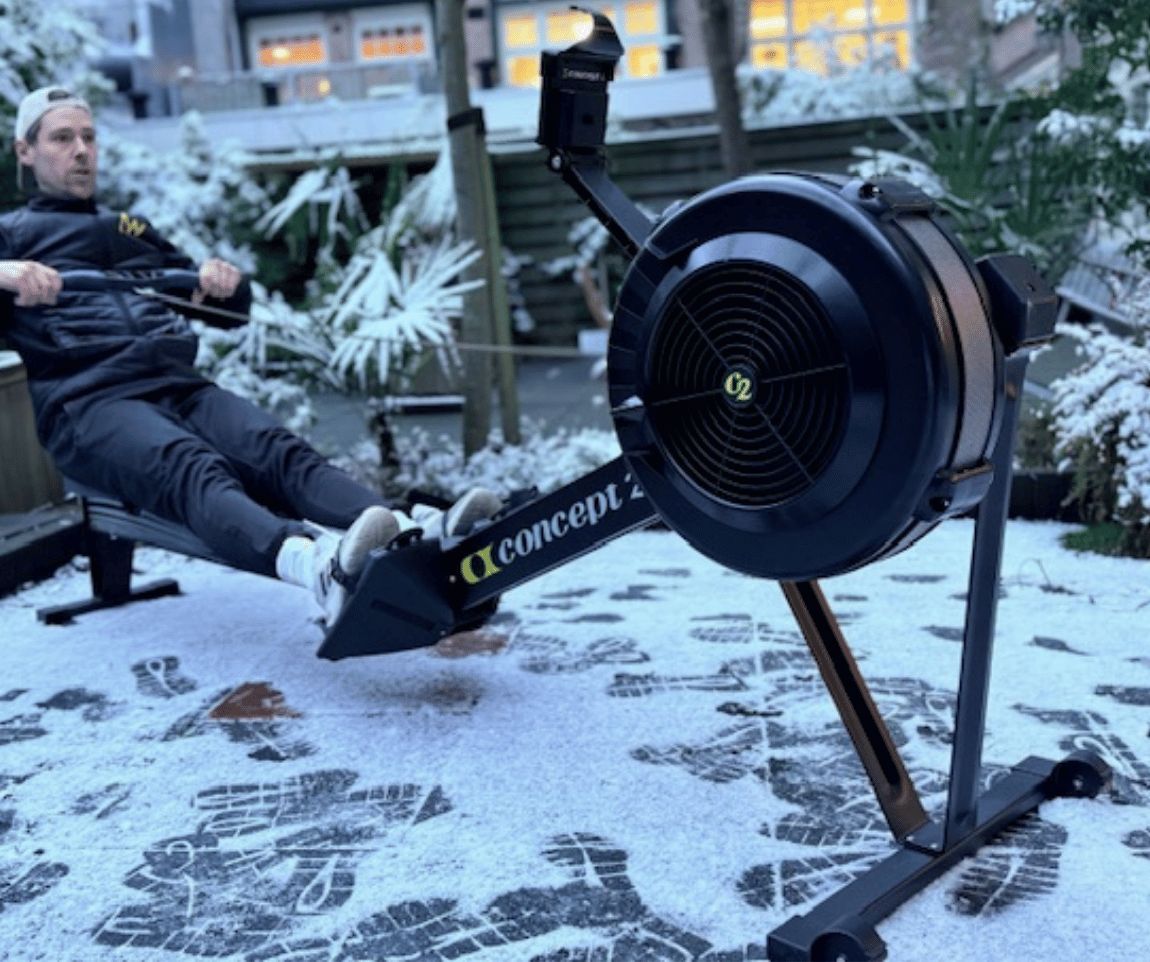 Rowing workout outdoors in the snow